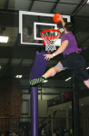 Young Boy Dunking on Trampoline Basketball Courts